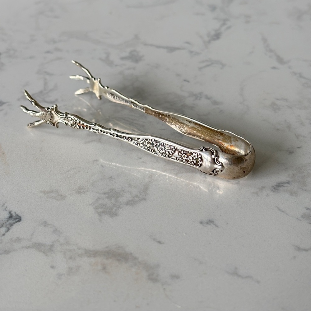 Antique sterling sugar tongs made by Whiting Manufacturing Co